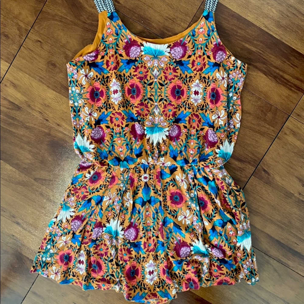 Floral romper with patterned straps